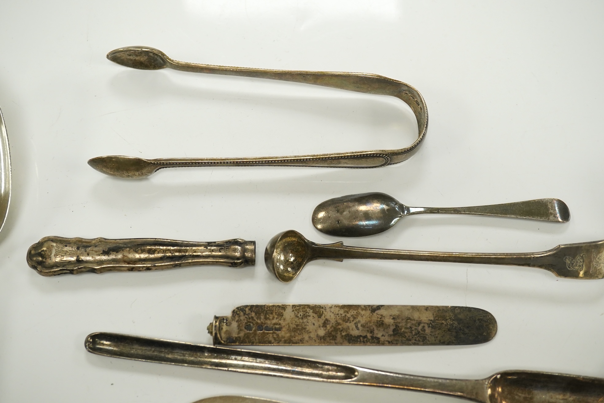 A set of three Victorian silver tablespoons, by Elizabeth Eaton, London, 1854, one other Victorian silver tablespoon, a pair of George III sauce ladles, London, 1790 and sundry silver flatware, including an 18th century